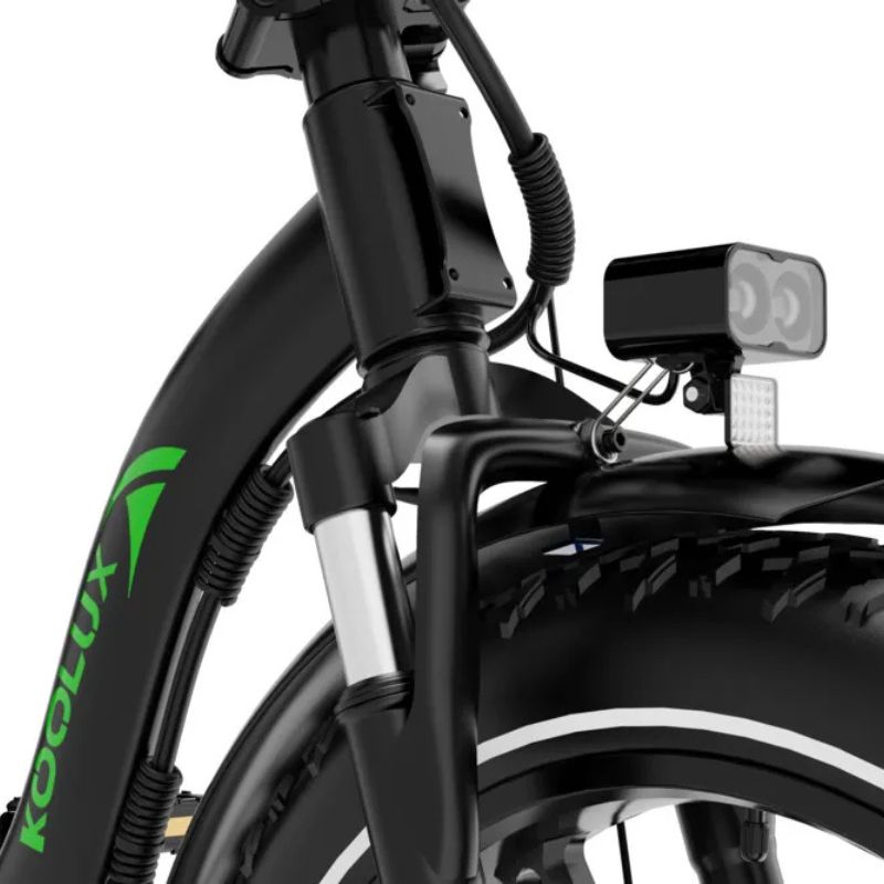 E‑bike unfolded in car trunk ready for travel