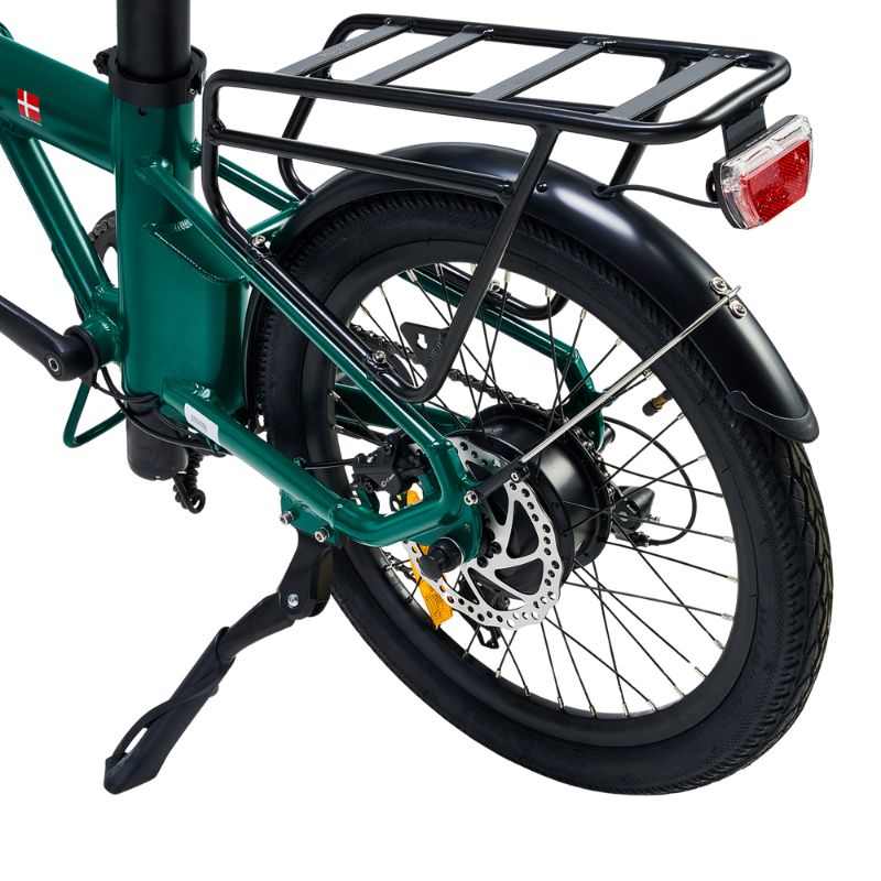 Rider commuting through city street on Virum E-Bike